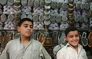 Child labor in a Pakistan Shop