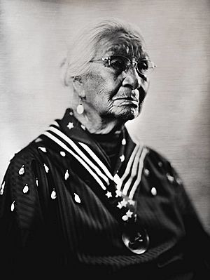 black and white portrait taken in 2016 of Native American tribal elder and storyteller Mary Louise Defender Wilson