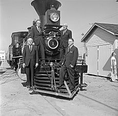 Officials at Fair Park, Atchison, Topeka, & Santa Fe, 'Cyrus K. Holliday' Locomotive No. 1 with Tender