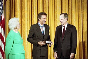 President George H. W. Bush and Mrs. Barbara Bush award the Presidential Medal of Freedom to NASCAR Driver Richard Petty