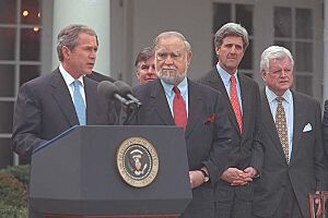 President George W. Bush speaks at a bill signing ceremony