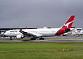 Qantas A330 rainy takeoff (6320617384)