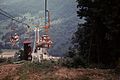 Ski lift carrying tourists to and from the top of the mountain summer 1964