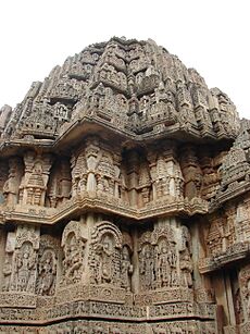 Stellate shrine outer wall with relief in Lakshminarayana temple at Hosaholalu