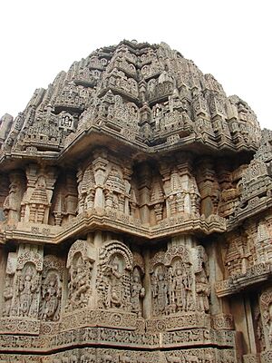 Stellate shrine outer wall with relief in Lakshminarayana temple at Hosaholalu