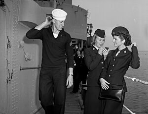 Two WAVES and a sailor aboard USS Uhlman (DD-687) at Terminal Island, California (USA), in 1950