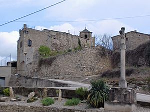 Vallfogona's castle and creu de terme (boundary cross)