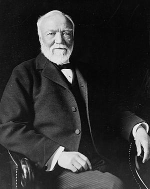 Andrew Carnegie, three-quarter length portrait, seated, facing slightly left, 1913 (cropped).jpg