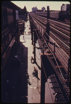BROOKLYN'S BUSHWICK AVENUE SEEN FROM AN ELEVATED TRAIN PLATFORM IN NEW YORK CITY. THE INNER CITY TODAY IS AN ABSOLUTE... - NARA - 555925