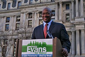 Dwight Evans at a rally outside City Hall