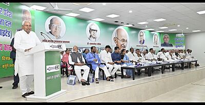 Nitish Kumar sharing stage with legislators of Janata Dal United at party's headquarter on the occasion of state council meeting