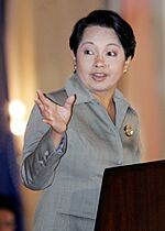 President Gloria Macapagal-Arroyo gestures to emphasize a point