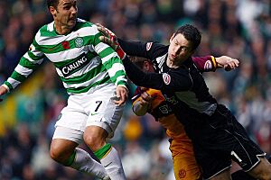 Scott McDonald (Celtic) and Graeme Smith (Motherwell)