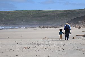 Walking along Sennen Beach in Cornwall