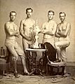 Yale's four-oared crew team with 1876 Centennial Regatta trophy