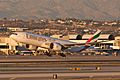 Emirates A6-EWA Boeing 777-200LR taking off from LAX (5222343985)