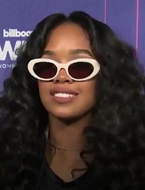H.E.R. at Billboard Women In Music, March 2022.jpg