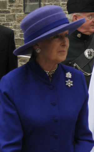 Princess Alexandra in a blue hat and dress