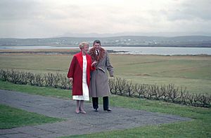 President Ronald Reagan walks with President Vigdis Finnbogadottir of Iceland