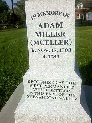White stone monument with text "In memory of Adam Miller (Mueller) b. Nov 17, 1703 d. 1783 Recognized as the first permanent white settler in this part of the Shenandoah Valley