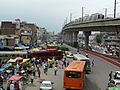 Delhi Metro and CNG Buses in Azadpur Neighborhood