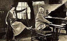 Director Harold Shaw rehearsing actress Viola Dana for 1923 film Rouged Lips