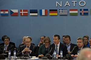 NATO Secretary General Anders Fogh Rasmussen, center right, speaks during a North Atlantic Council meeting at NATO headquarters in Brussels June 4, 2013 130604-D-BW835-241