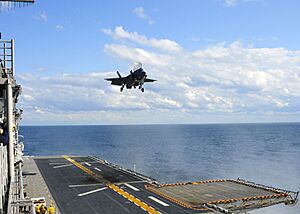 US Navy 111003-N-ZZ999-002 An F-35B Lightning II makes the first vertical landing on a flight deck at sea aboard the amphibious assault ship USS W
