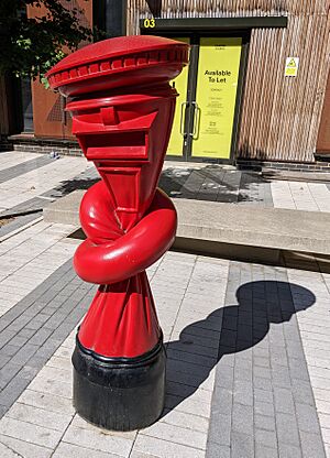 Alphabetti Spaghetti sculpture by Alex Chinneck - Canning Town, London