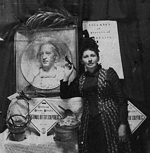 Caroline S. Brooks with a butter sculpture bas-relief of Columbus for the 1893 Columbian Exposition in Chicago