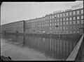Holyoke, Massachusetts - Scenes. The Canal, the best tradition of a home industry, founded elsewhere and... - NARA - 518296