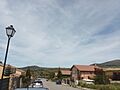Panoramic view of Los Ángeles de San Rafael in the far distance from La Estación de El Espinar