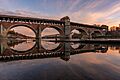 Ponte Coperto al tramonto con i suoi riflessi