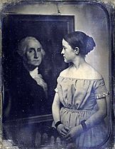 Young girl with portrait of George Washington (05)