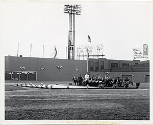 An orchestra waits to perform in Fenway Park (12305745293)