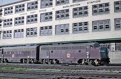 CGW 155 and 152 (F7As) Passenger Train 13, the Nebraska Limited pulling into Burlington Station in Omaha, NE on August, 8, 1962 (22254990909).jpg