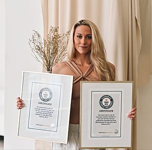 Cassandra De Pecol Holding Her Two Guinness Records She Obtained.jpg
