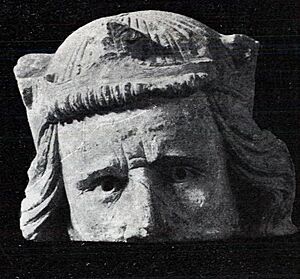 Head (possibly Haakon V of Norway)