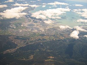 Stoke is slightly right of centre, lying between Richmond on the left and Tāhunanui under the coastal cloud on the right