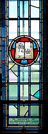 Royal Military College of Canada Saint Raphael’s Roman Catholic Chapel memorial window to John Carson Emblem Bible and Torch.jpg