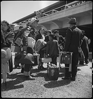 San Bruno, California. Family of Japanese ancestry arrives at assembly center at Tanforan Race trac . . . - NARA - 537480