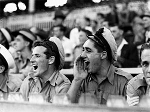 StateLibQld 1 78769 Navy men cheering for their soccer team, Brisbane, March 1945