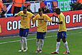 André Santos, Neymar and Ramires celebrate Neymars goal