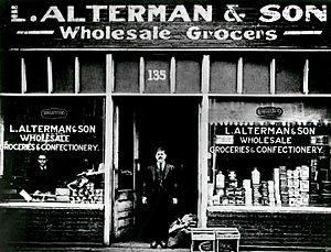 Atlanta, GA circa 1923. Photograph of Alterman & Sons Wholesale Grocers. Louis Alterman is standing in doorway The store was located on 135 Decatur Street, Atlanta, Georgia