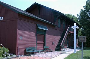 BURLINGTON, CEDAR RAPIDS, AND NORTHERN RAILROAD ROCK RAPIDS STATION, RAILROAD TRACK AND BRIDGE