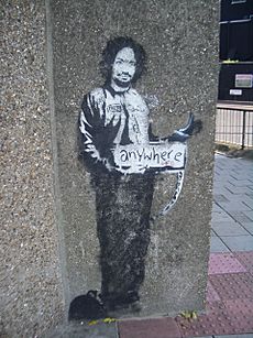 Banksy Hitchhiker to Anywhere Archway 2005