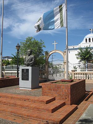 Vega Alta central plaza, municipal flag  of Vega Alta and Catholic church