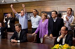G8 leaders watching football