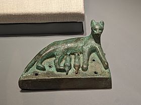 Late ancient Egyptian bronze statuette of a mother cat nursing her kittens, dating c. 664 – c. 332 BCE, Eskenazi Museum of Art