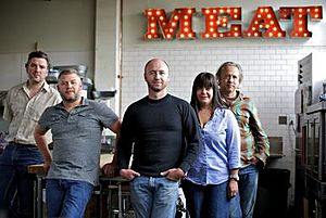 Olympia Provisions Owners under meat sign
